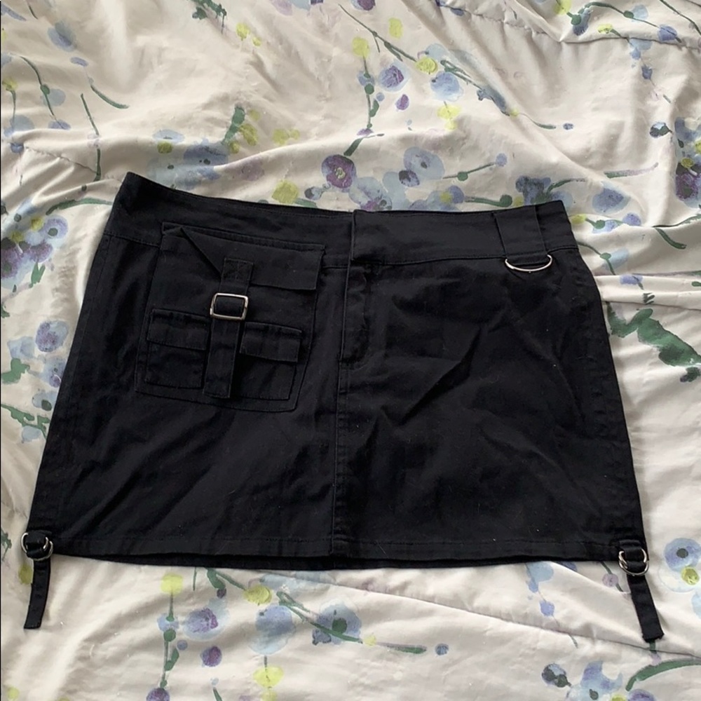 black buckled mini-skirt